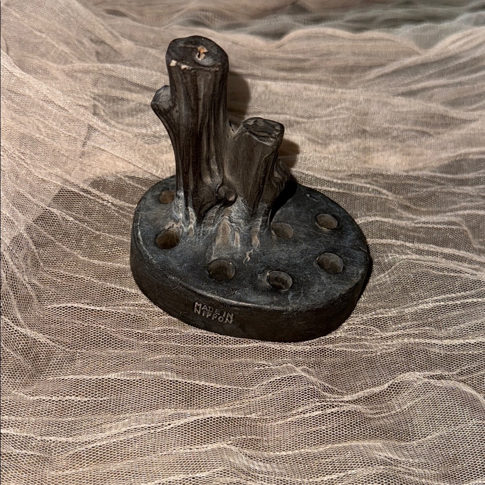 Nippon bisque ceramic flower frog fashioned to resemble a dark tree stump